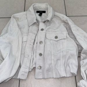 White cardigan (color is faded)